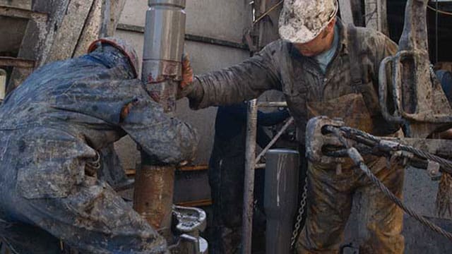 Crude prices plummet to 11-month low