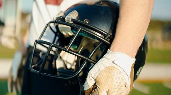 Football’s popularity soars despite CTE risks awareness